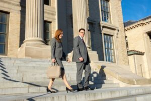 Attorneys Matthew Bligh and Erin Hargis leaving courthouse