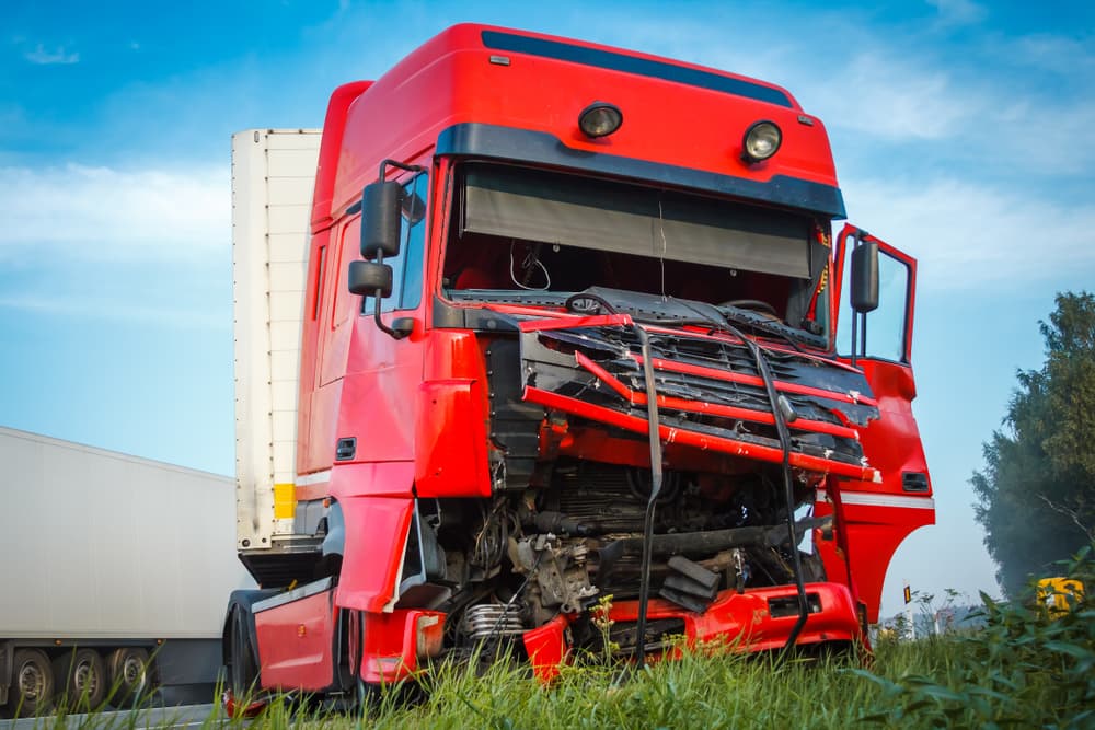 Damaged truck after road accident