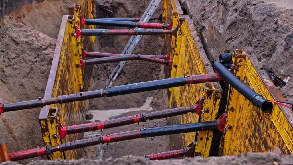 Trench shoring system in Long Island excavation site preventing trench collapse accidents and ensuring worker safety